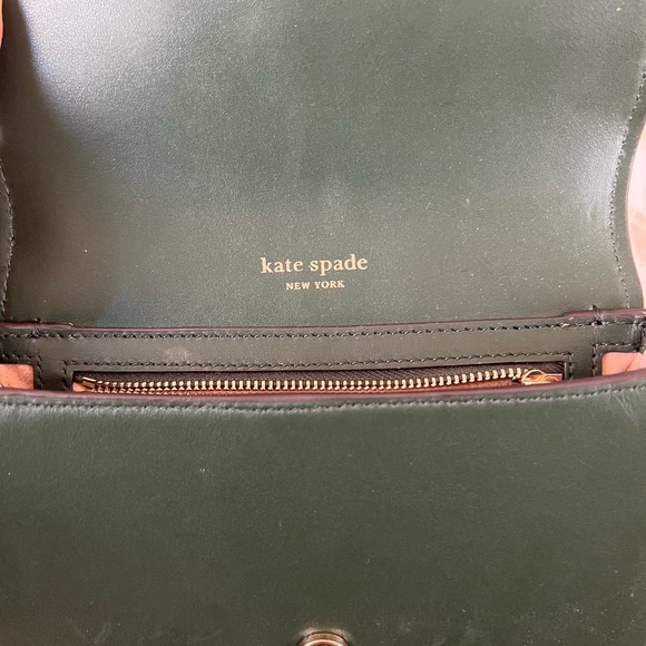 Kate Spade

lula small saddle bag

Shades of purple peekaboo at the bottom - Picture 4 of 6